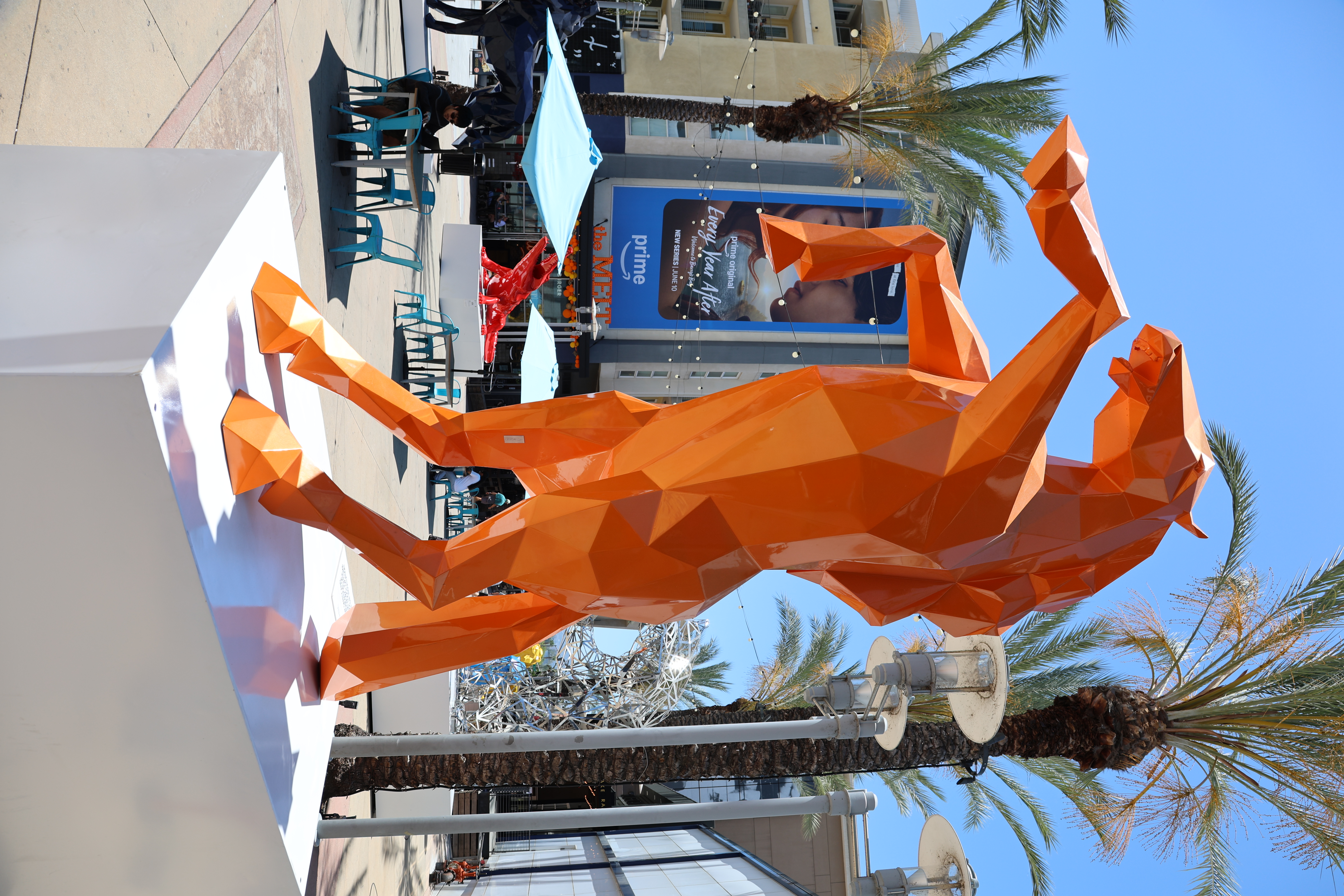 Richard Orlinski orange horse sculpture on the AMC Walkway in downtown Burbank